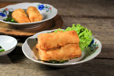 Sosis solo or fried egg crepe with minced beef or chicken filling.