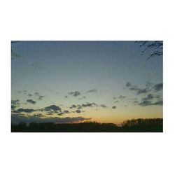 Scenic view of landscape against sky during sunset