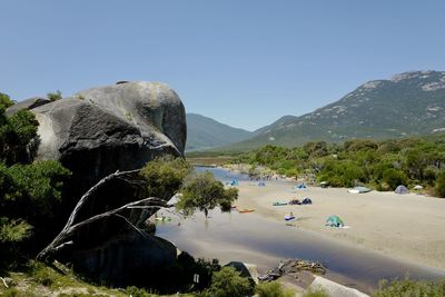 Scenic view of beach against clear sky