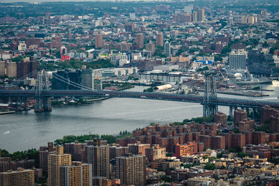 High angle view of bridge and buildings in city
