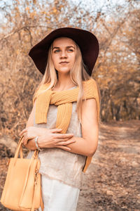 Portrait of a young woman wearing hat