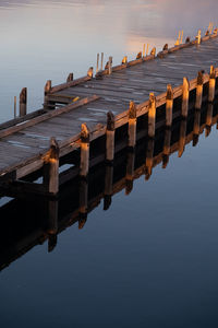 Pier over river against sky