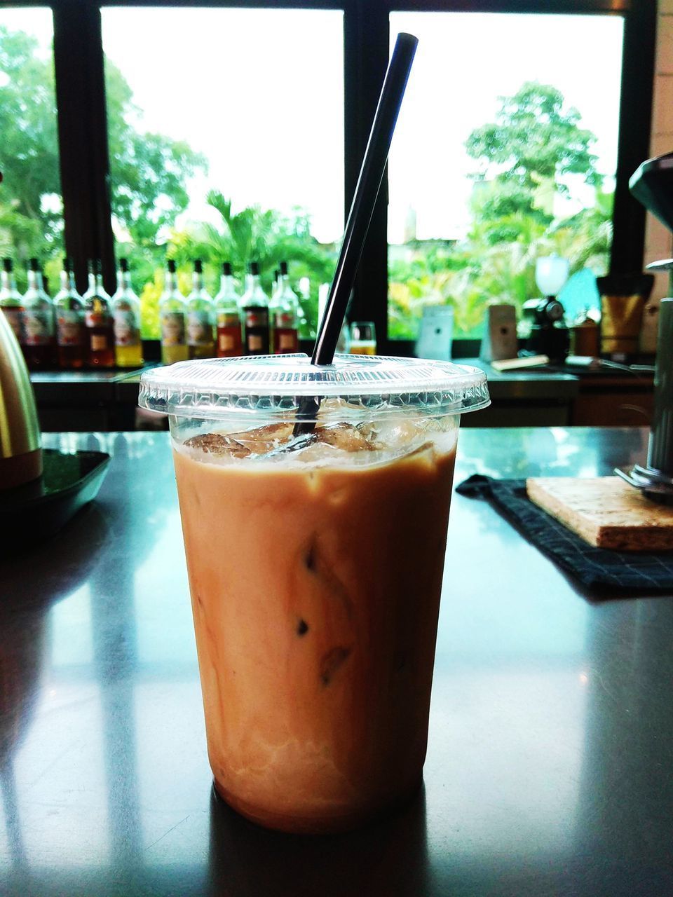 CLOSE-UP OF DRINK WITH ICE CREAM