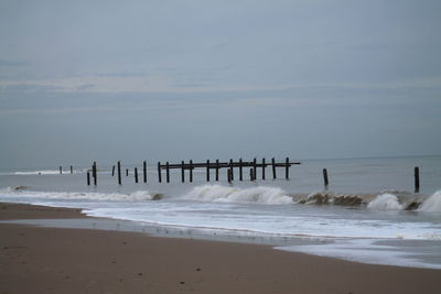 Scenic view of beach against sky