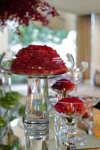Close-up of red glass on table