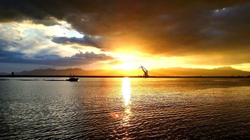 Scenic view of sea at sunset