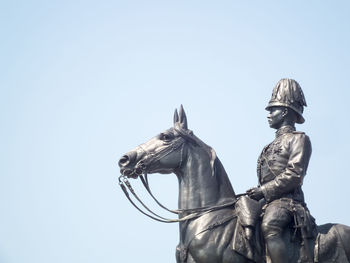 Low angle view of statue against clear sky