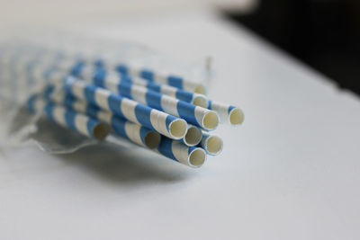 High angle view of white buttons on table