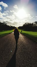 Road passing through field