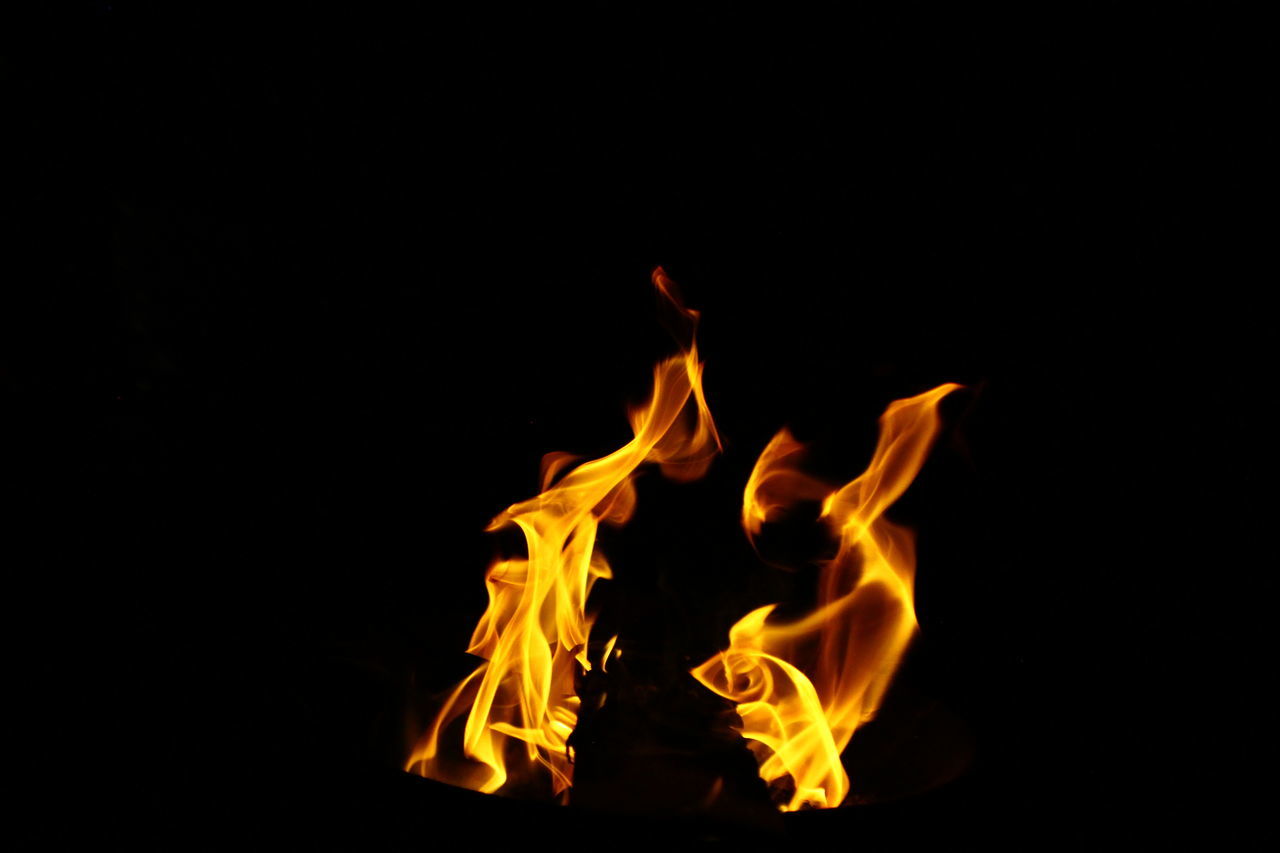 burning, fire, flame, black background, heat, yellow, studio shot, font, darkness, no people, copy space, nature, motion, orange color, indoors, black, light, close-up, warning sign, cut out, communication, glowing, sign, campfire