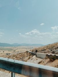 Scenic view of land against sky