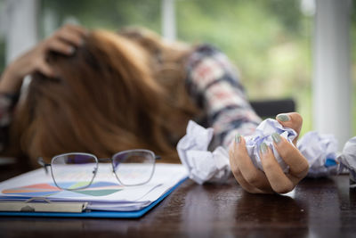 Midsection of woman using mobile phone