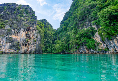 Scenic view of sea against mountain