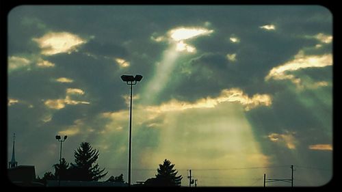 Low angle view of cloudy sky at sunset