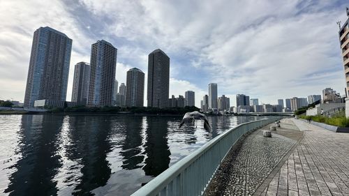 Buildings in city against sky