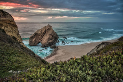 Scenic view of sea against sky during sunset