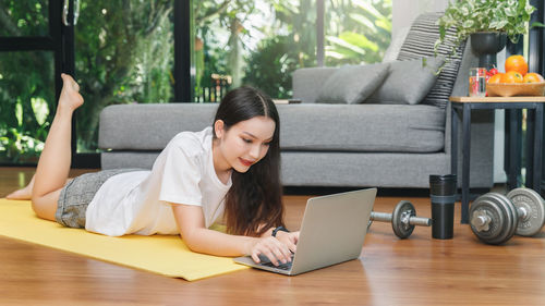 Young woman using mobile phone