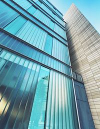 Low angle view of modern glass building