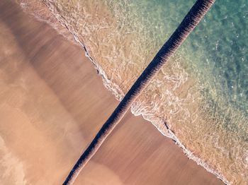 High angle view of water flowing on table