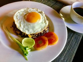 Close-up of breakfast served on table