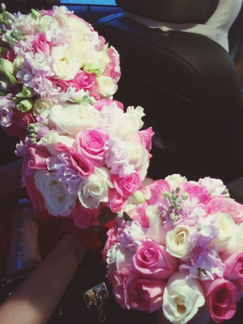 flower, petal, fragility, freshness, flower head, indoors, bouquet, pink color, vase, close-up, bunch of flowers, high angle view, rose - flower, beauty in nature, flower arrangement, blooming, nature, table, decoration, pink