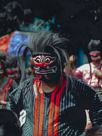 Portrait of man with mask