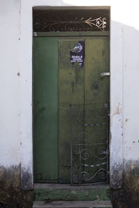 Closed door of old abandoned building