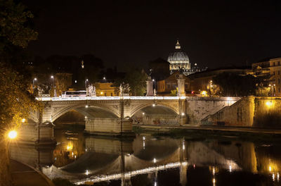 Bridge over river at night