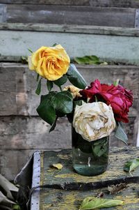 Close-up of rose bouquet on wood