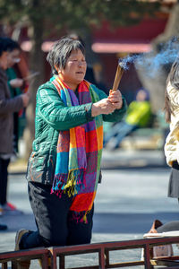 Full length of woman standing outdoors