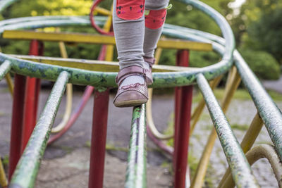 Low section of child on playground at park