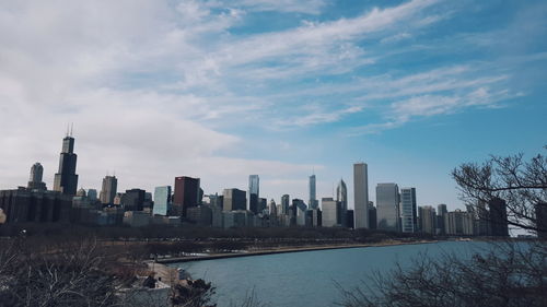 View of city against cloudy sky