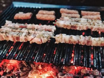 Close-up of meat on barbecue grill