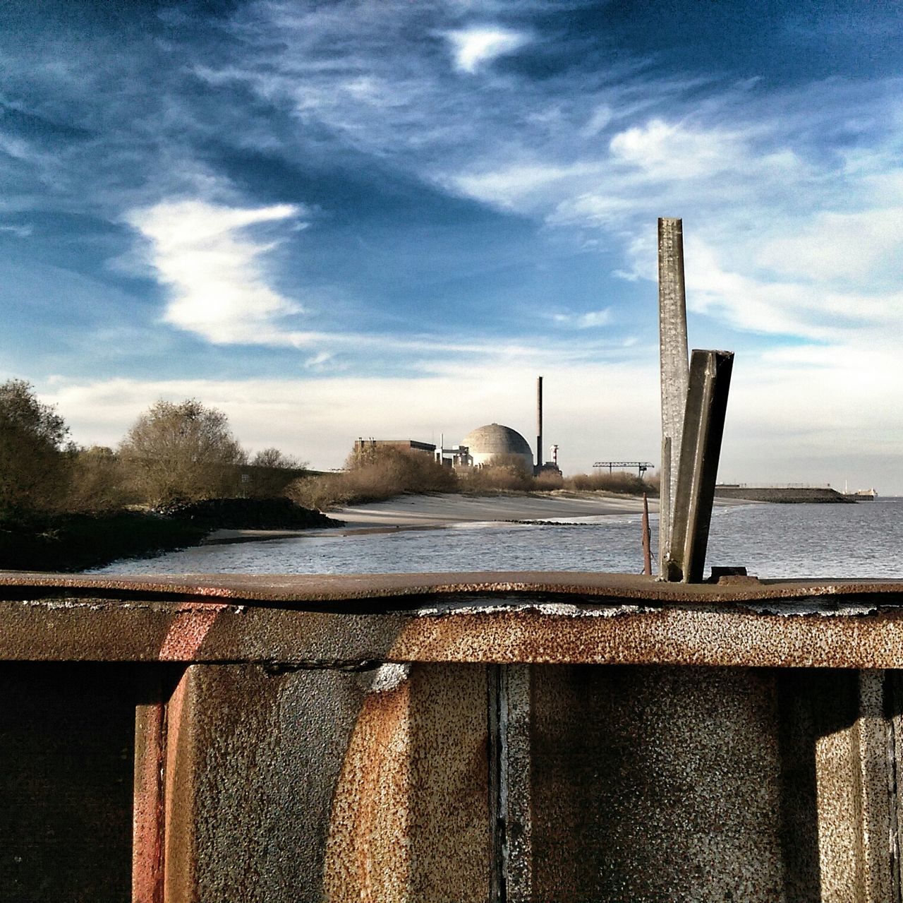 sky, built structure, architecture, building exterior, cloud - sky, wood - material, sea, house, cloud, water, day, nature, outdoors, cloudy, roof, no people, pier, weather, railing, wooden