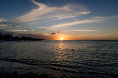 Sunset on main beach of isla holbox in mexico.