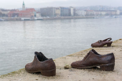 Monument to the holocaust victims shoe memorial on the danube embankment in budapest, hungary
