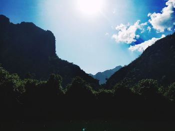 Scenic view of silhouette mountains against sky