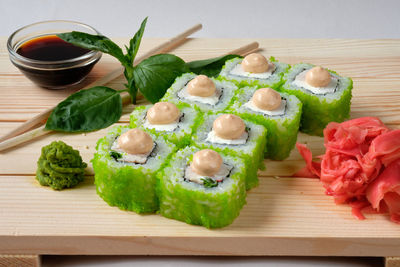 Close-up of sushi served on table
