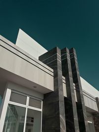 Low angle view of modern building against clear sky