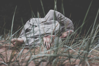 Man lying on field