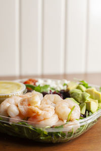 Close-up of fresh salad in plate on table