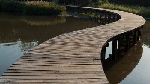 Wooden jetty on pier over lake