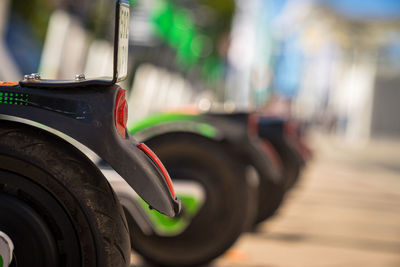 Close-up of electric push scooters