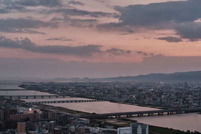 High angle view of buildings against sky at sunset