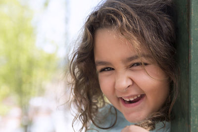 Close-up portrait of smiling girl