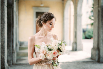 Young woman holding bouquet