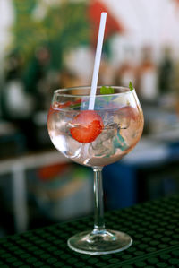 Close-up of wineglass on table