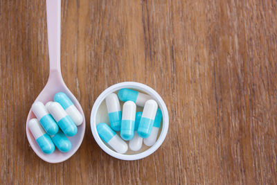 High angle view of eggs on wooden table