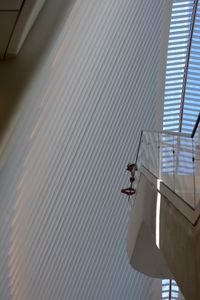 Low angle view of people on a public balcony 