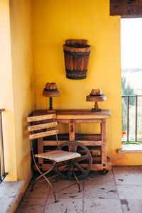 Chairs and table against wall in old house